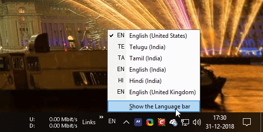صورة لـ كيفية إظهار أو إخفاء مُؤشر الإدخال وشريط اللغة في نظام Windows 10 | input-indicator-win10-undock-language-bar-DzTechs