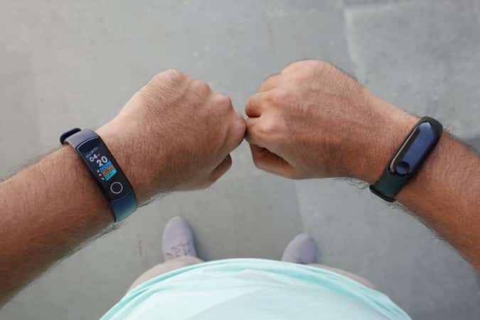 صورة لـ مُقارنة بين Honor Band 4 و Mi Band 3 – أيهما يحتوي على أفضل المميزات؟ | display-comparison-min-DzTechs