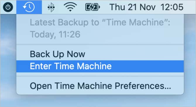 صورة لـ طرق لاستعادة البيانات من النسخ الاحتياطية لـ Time Machine | Enter_Time_Machine_option_from_the_menu_bar_in_macOS-vcbFyFfs-DzTechs