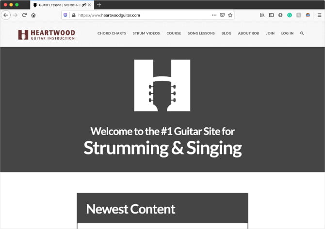 صورة لـ أفضل المواقع للعثور على أوتار الغيتار لعزف الأغاني الشائعة | Heartwood_Guitar_home_page-s40jzIfs-DzTechs