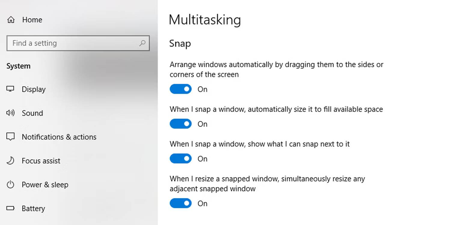 صورة لـ كيفية تقسيم الشاشة في Windows 10 إلى العديد من النوافذ | windows-snap-assist-settings