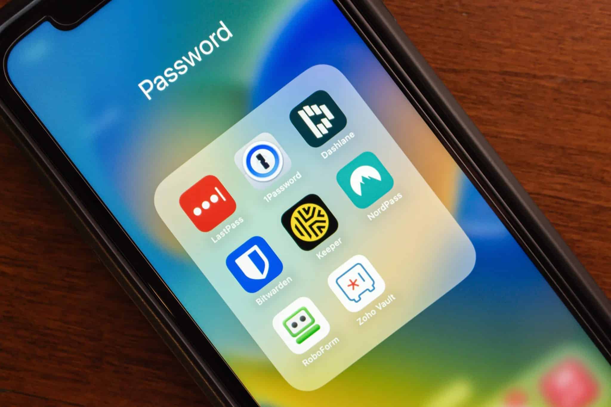 Password manager app logos on smartphone screen.