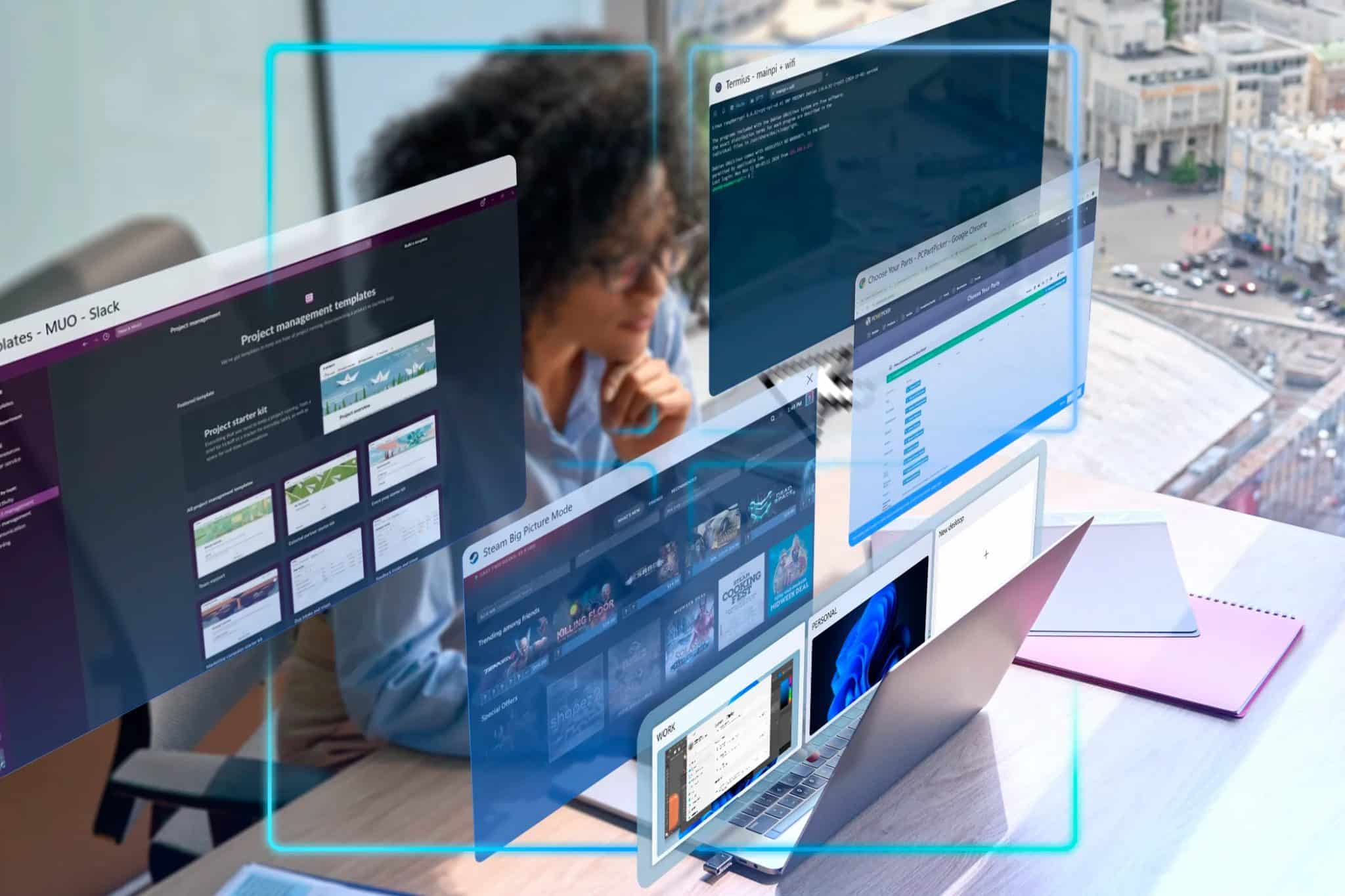 A woman at an office desk using her laptop with multiple virtual desktops.