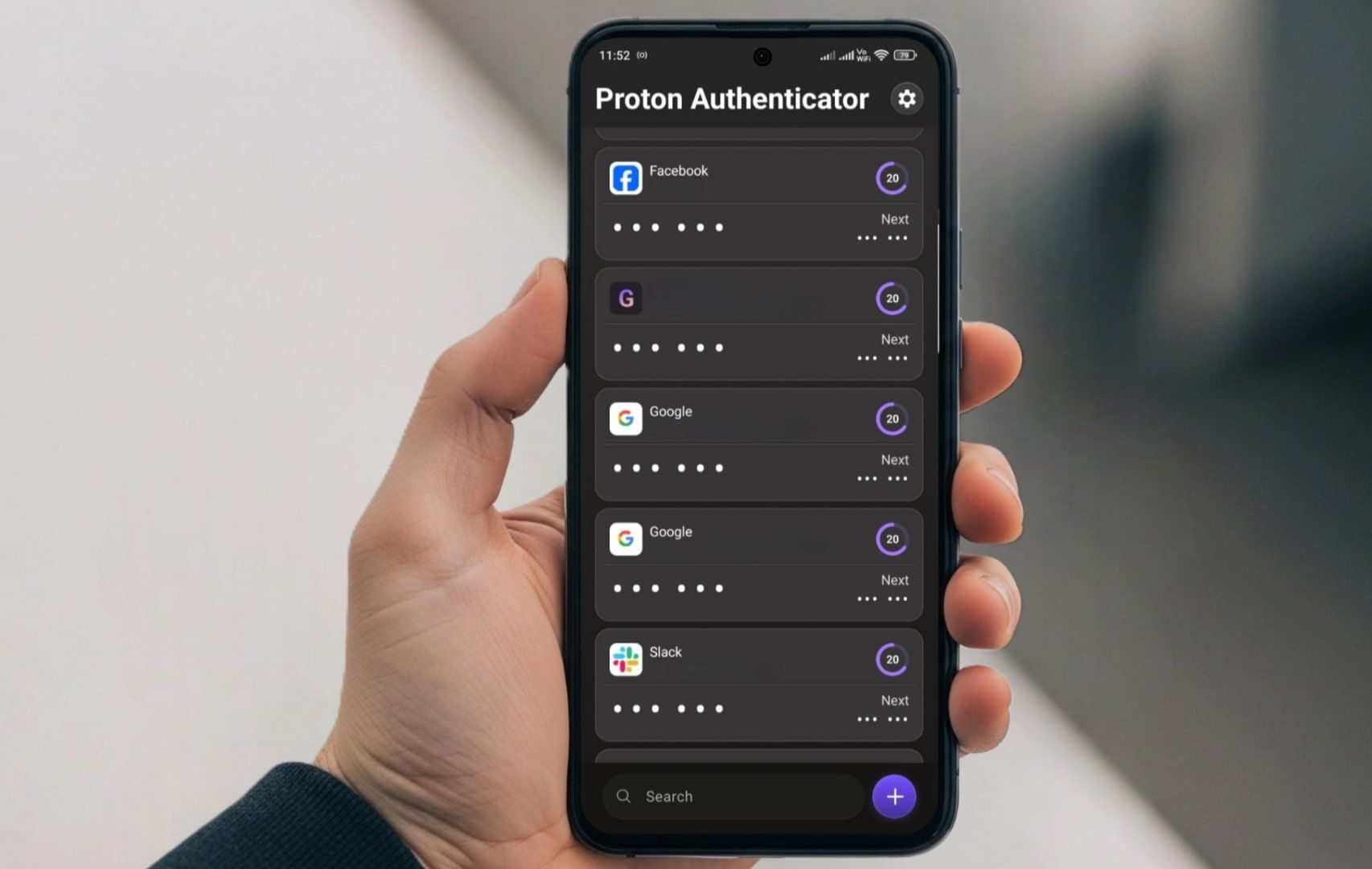 A hand holding a phone with Proton Authenticator app opened.