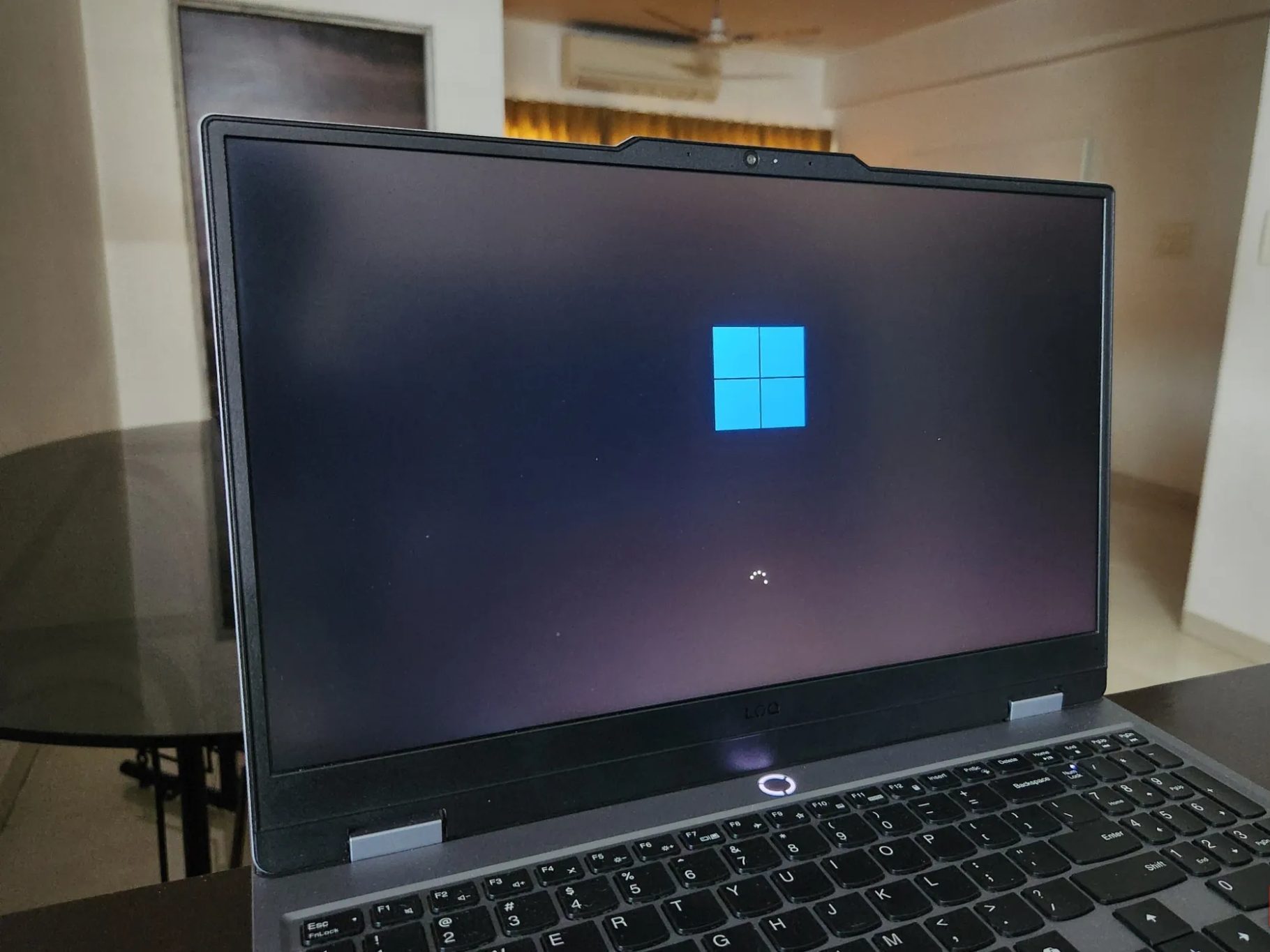 Lenovo laptop showing Windows 11 startup screen