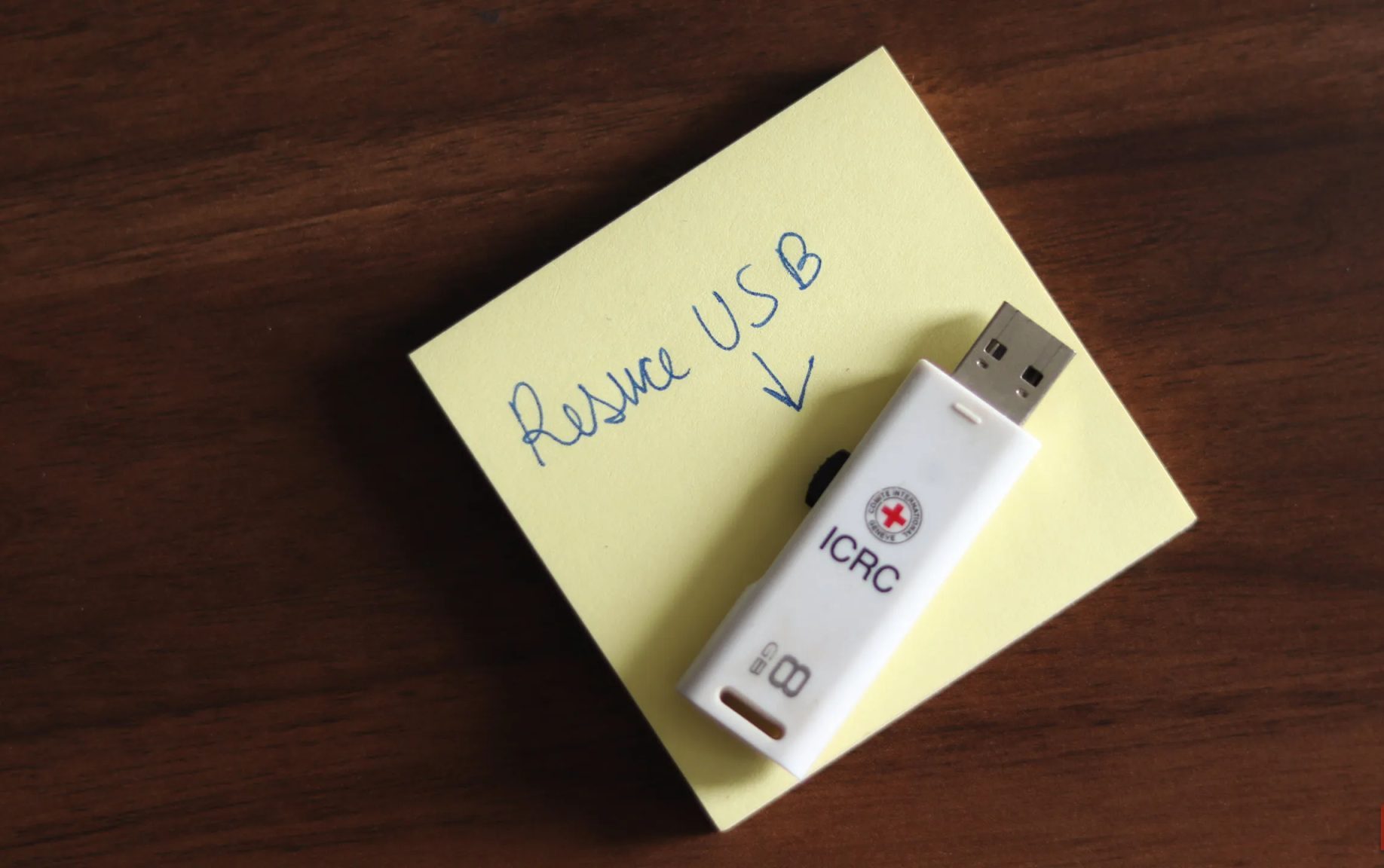 A rescue USB drive on a table.