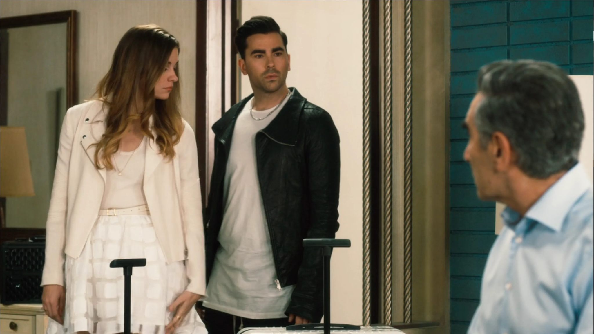 David and Alexis from Schitt's Creek looking at Johnny