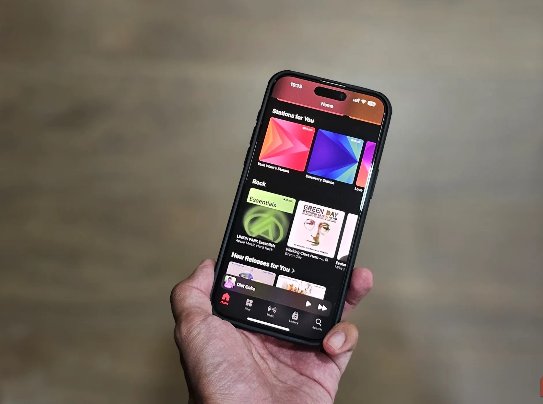 Home tab in the Apple Music app on an iPhone.