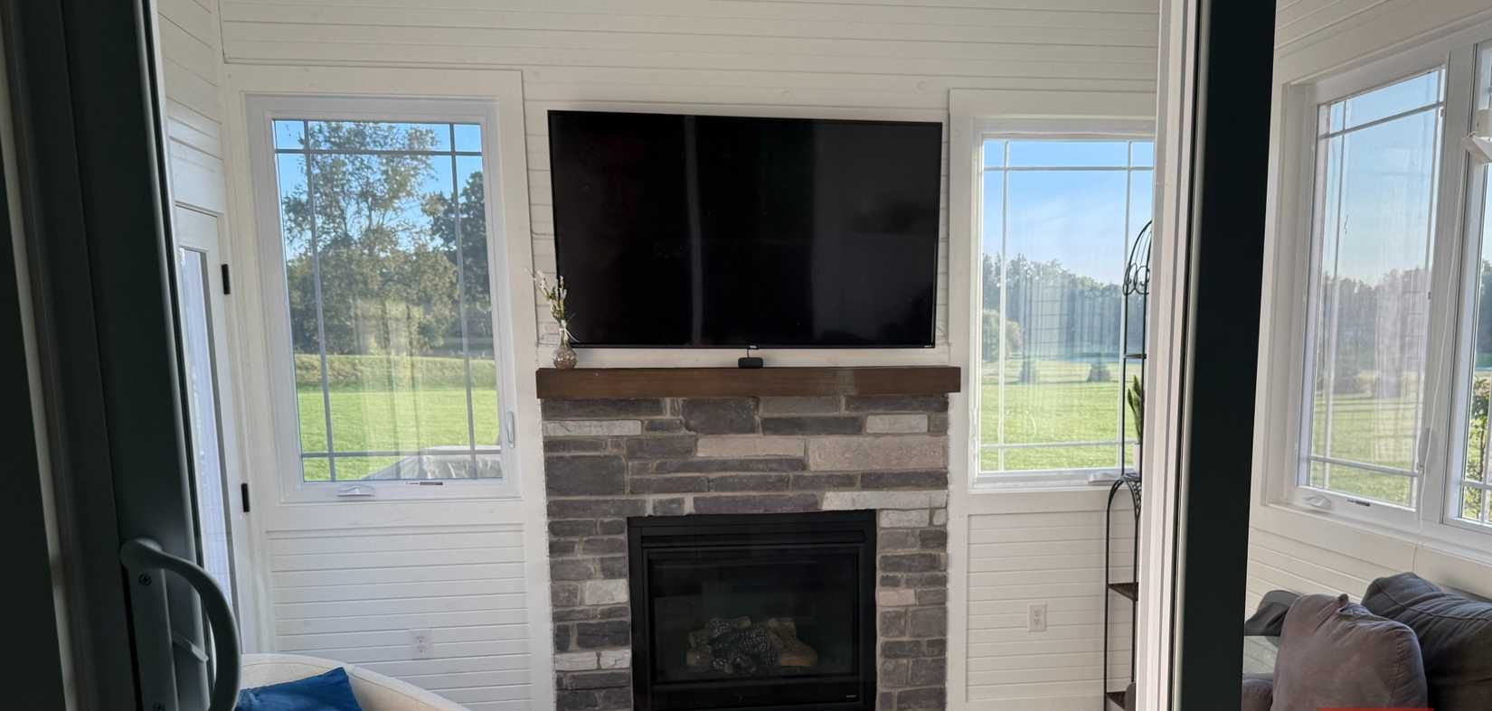 3 seasons room with tv and slider door closed