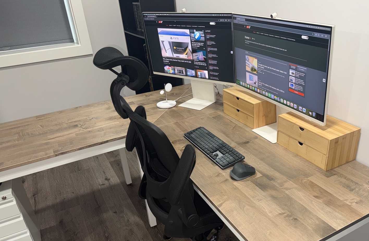 desk with 2 white samsung monitors keyboard and mouse