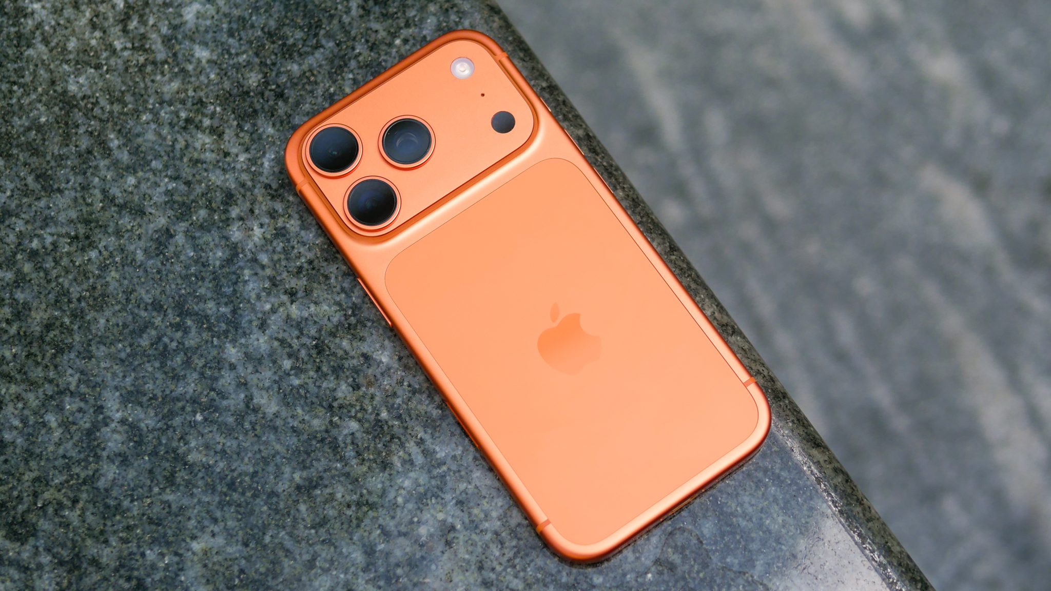 iPhone 17 Pro on the edge of a seat.