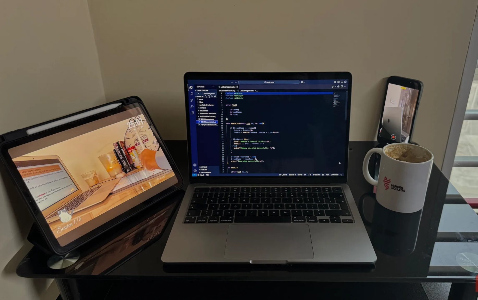MacBook, iPad and Phone on desk