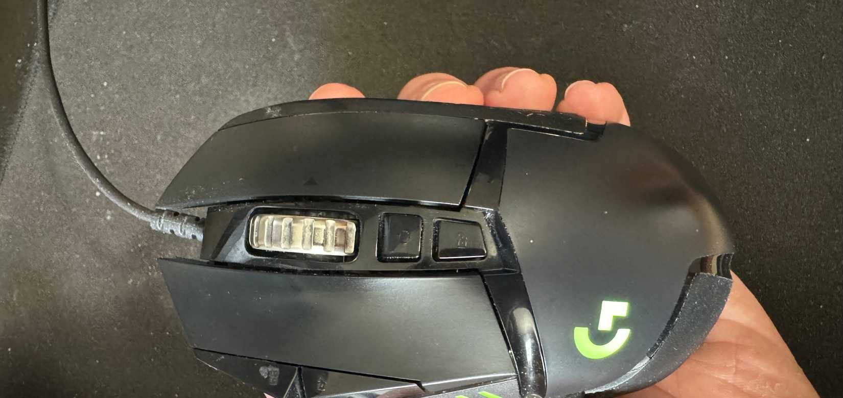 Logitech G502 Mouse Held in Hand