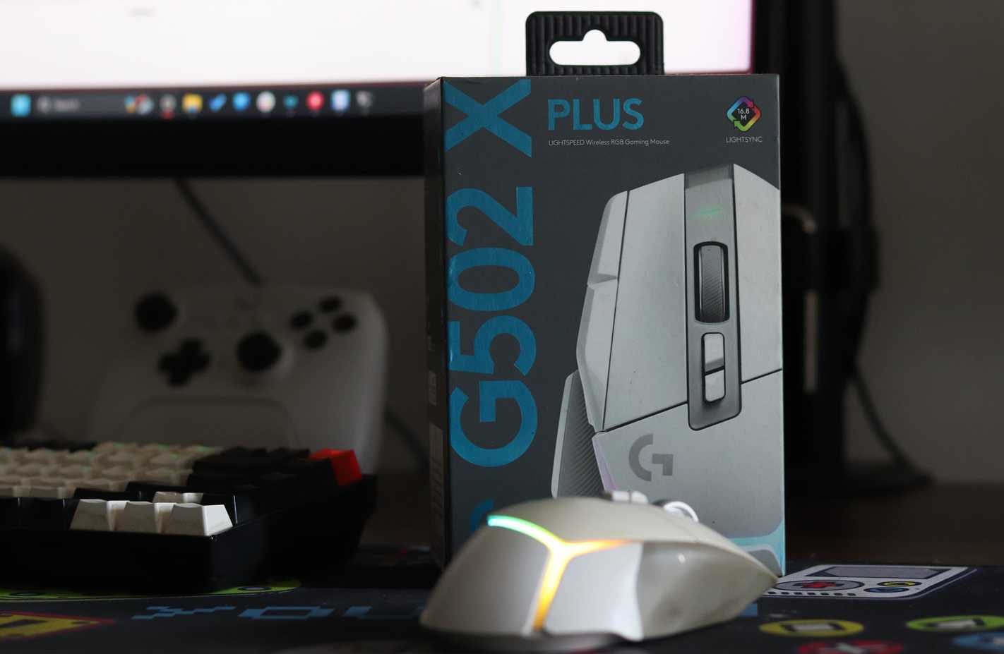 Logitech G502X Plus mouse with box.
