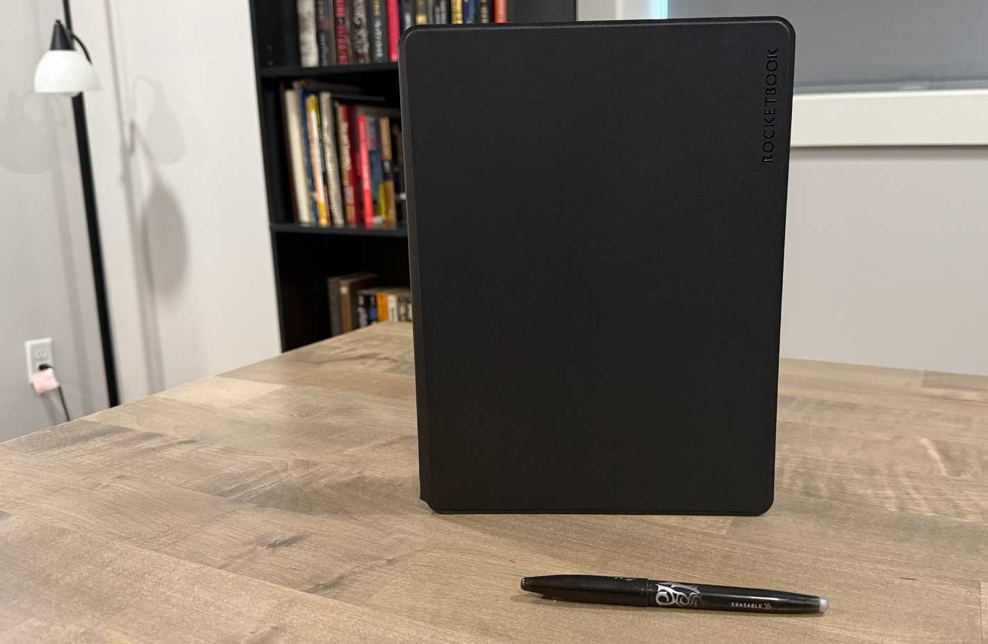 rocketbook pro standing on desk with pen in front