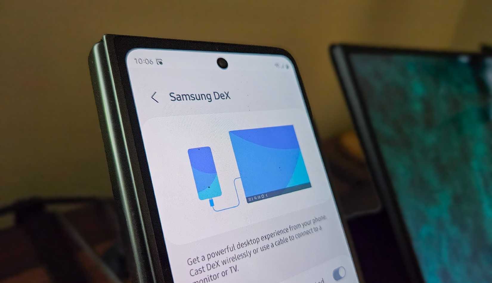 Samsung DeX on a Samsung Galaxy Z Fold 5 next to a portable monitor.