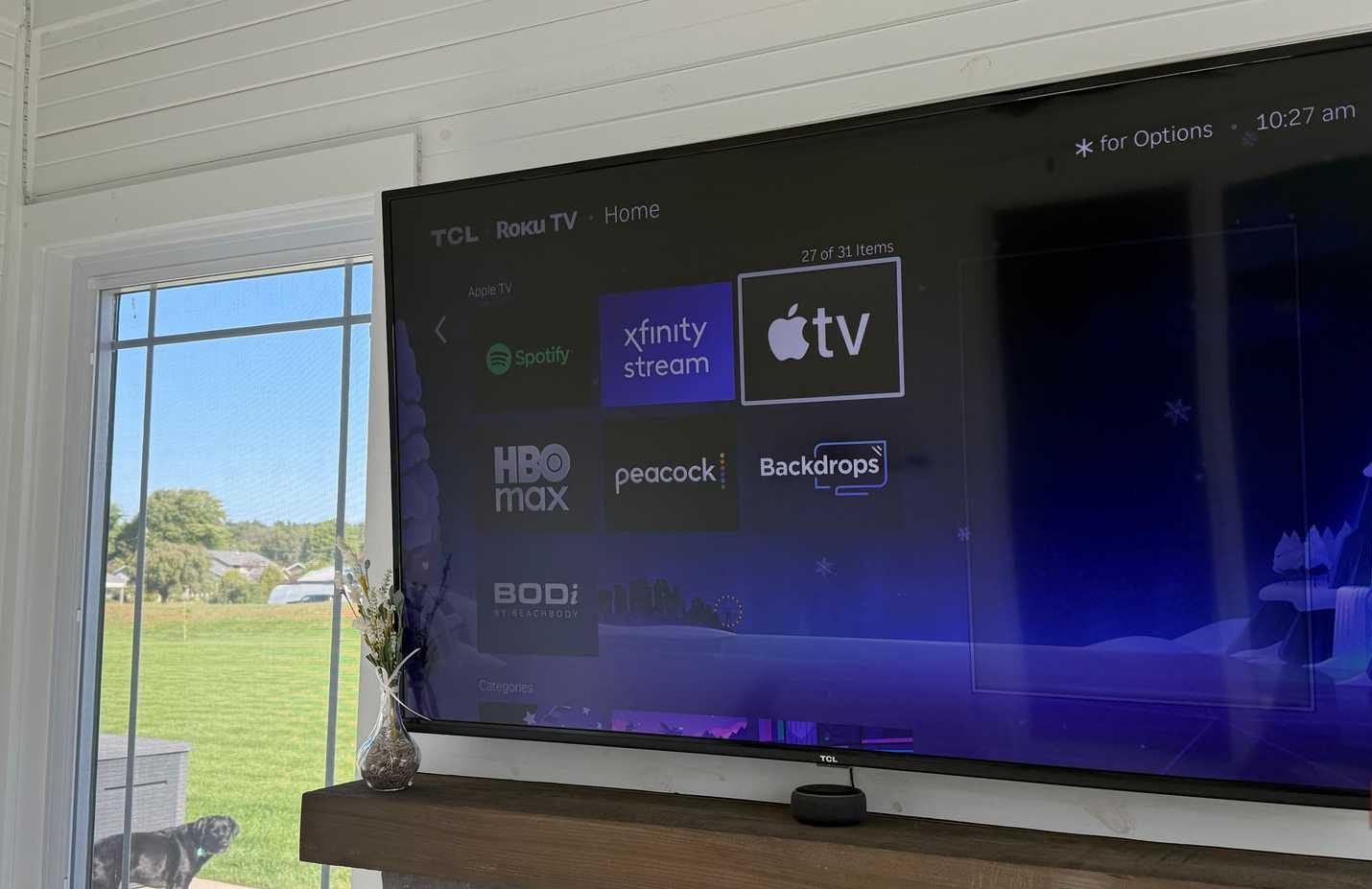 smart tv in 3 seasons room wall mounted