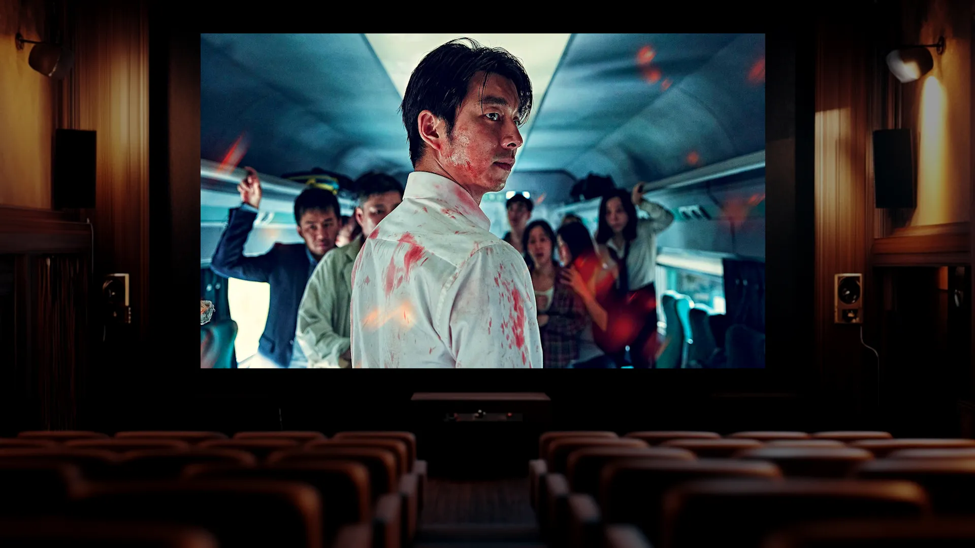 عرض فيلم قطار إلى بوسان على شاشة السينما.