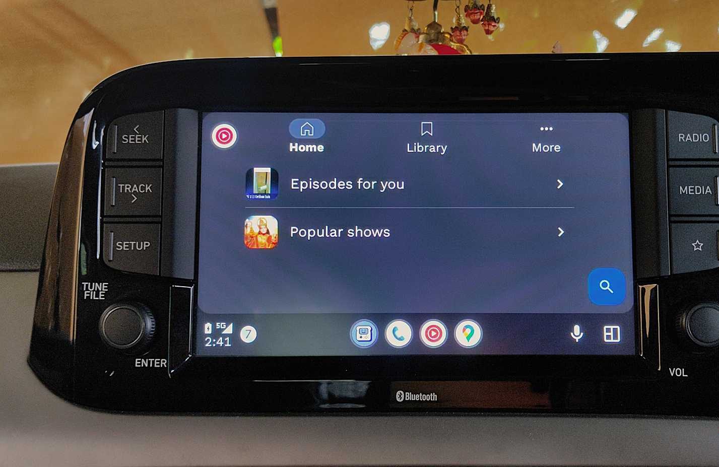 YouTube music Home library with multiple playlists visible on Android Auto.