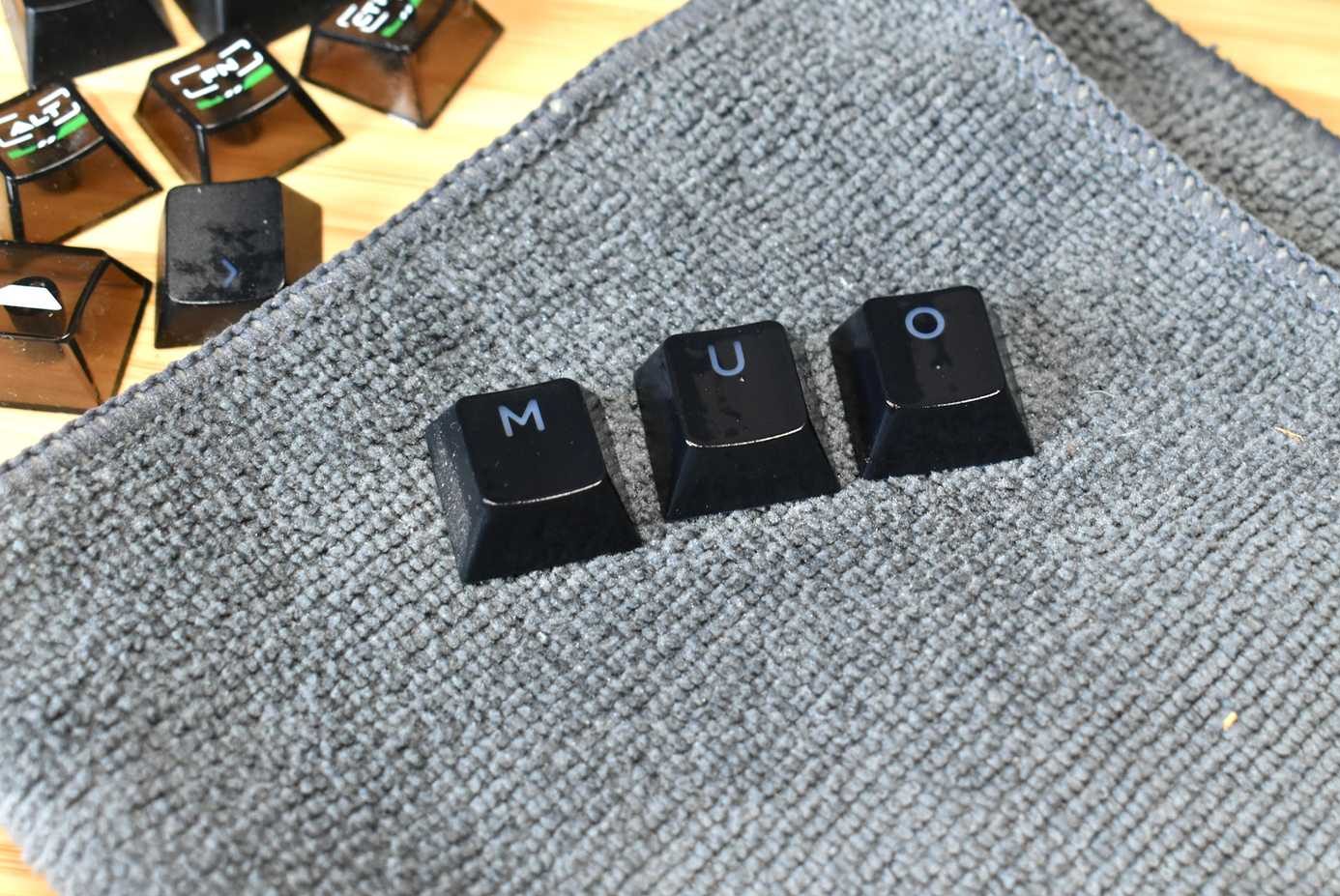 keycaps close up on micro fiber cloth.